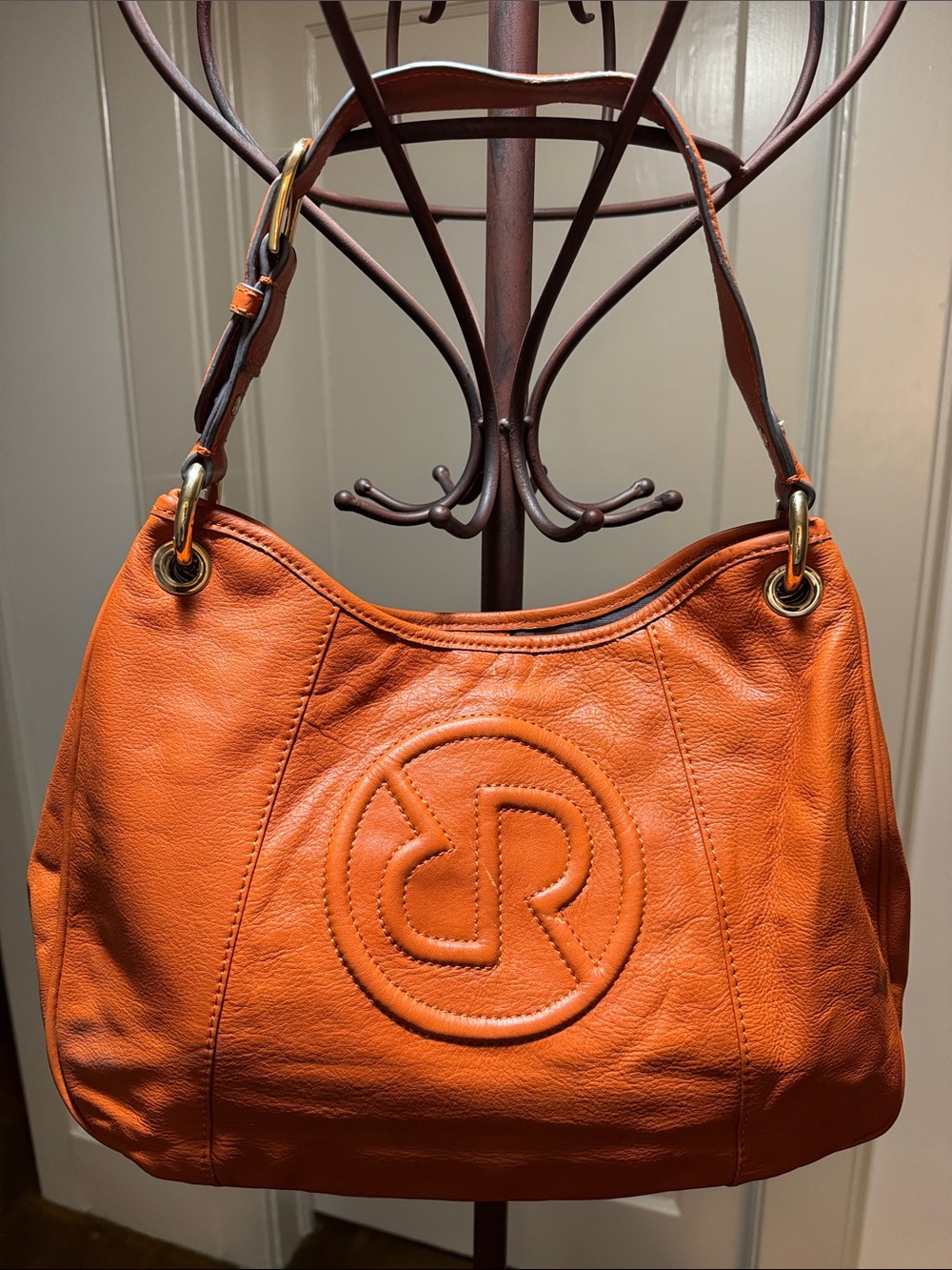Burnt Orange Leather Shoulder Bag with Embossed Round Logo